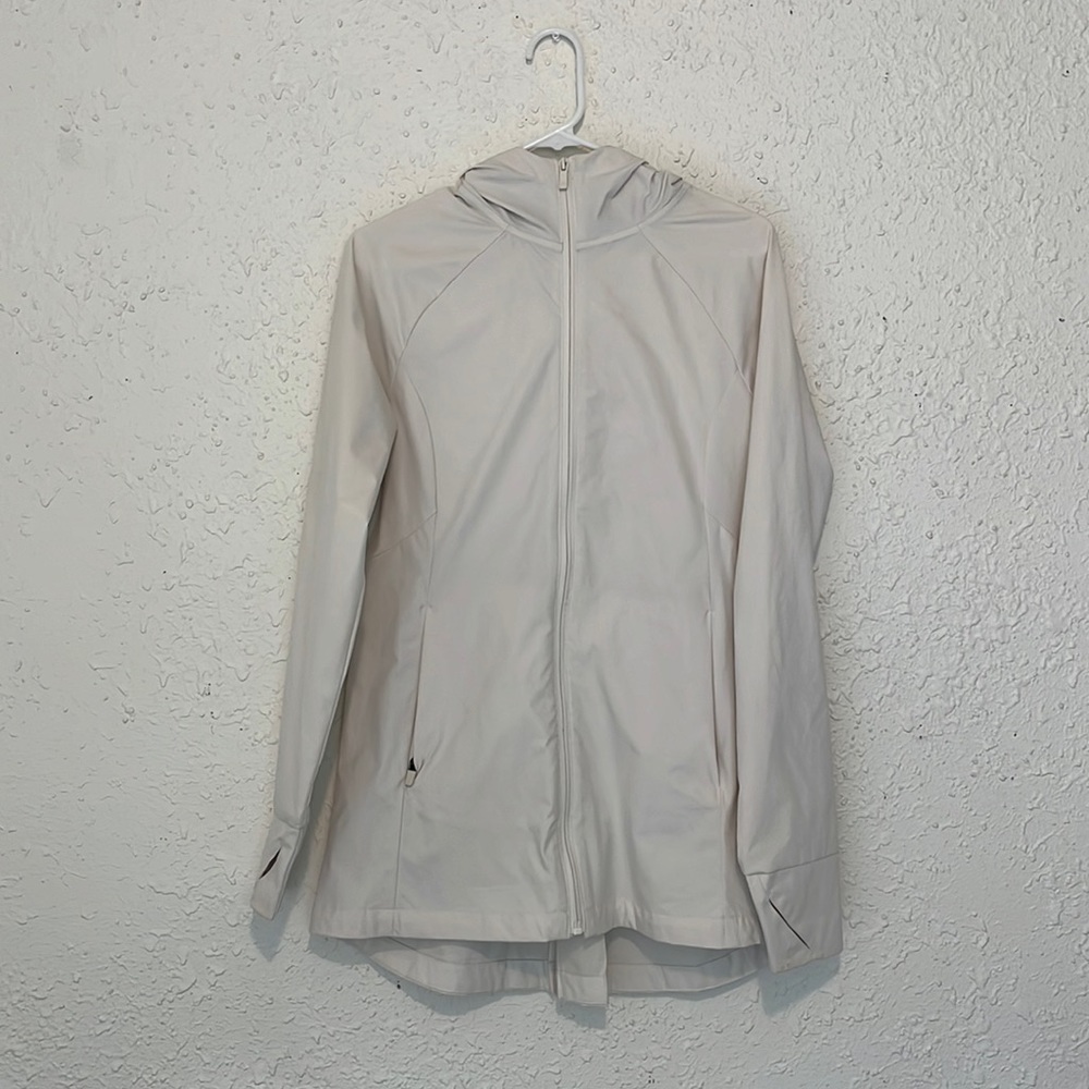 Eggshell active raincoat from All in Motion. Only worn twice.